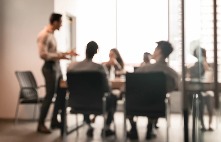 people sitting around a conference table