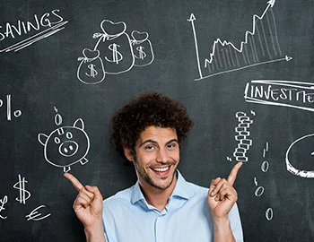 a man pointing at drawings on a chalkboard