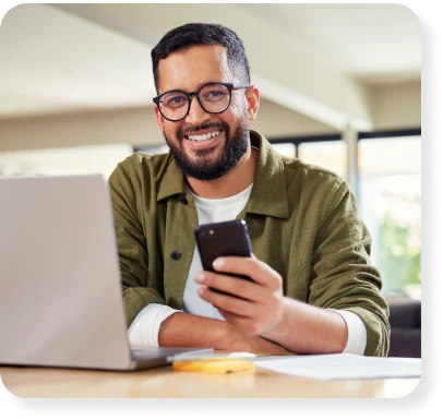 a man looking at his IRA on his phone