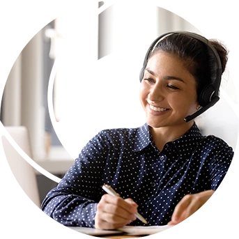 a woman wearing a headset and smiling