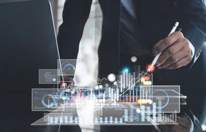 a hand drawing a trend graph in mid-air