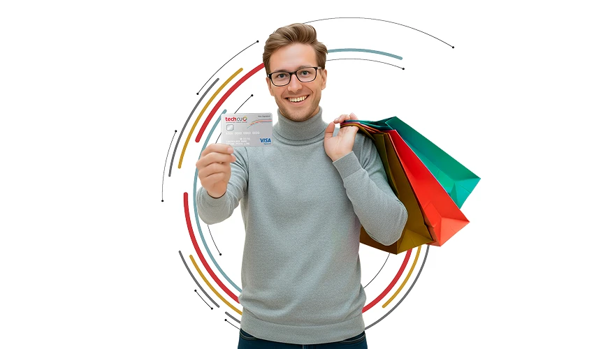 a man holding shopping bags and a credit card
