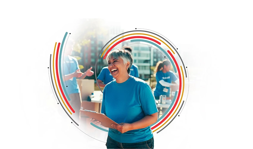 a woman with a clipboard volunteering at an event