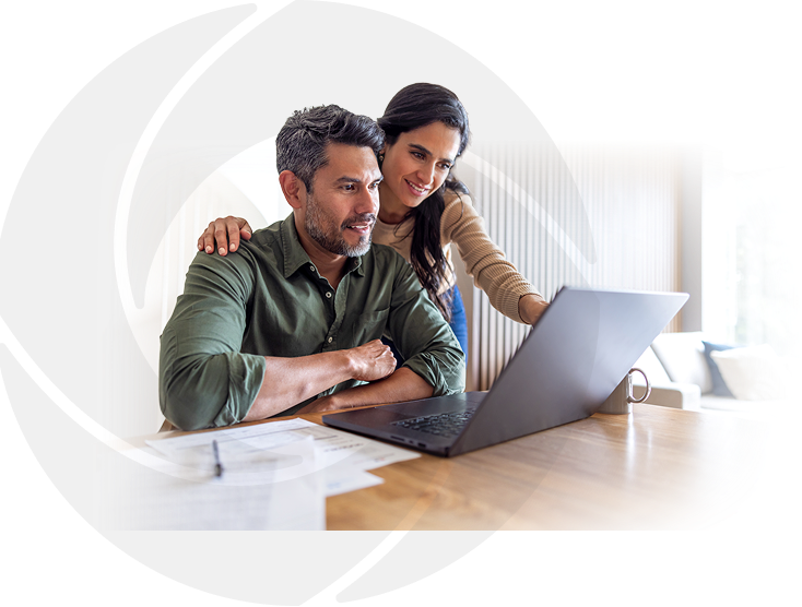a couple viewing their finances on a laptop